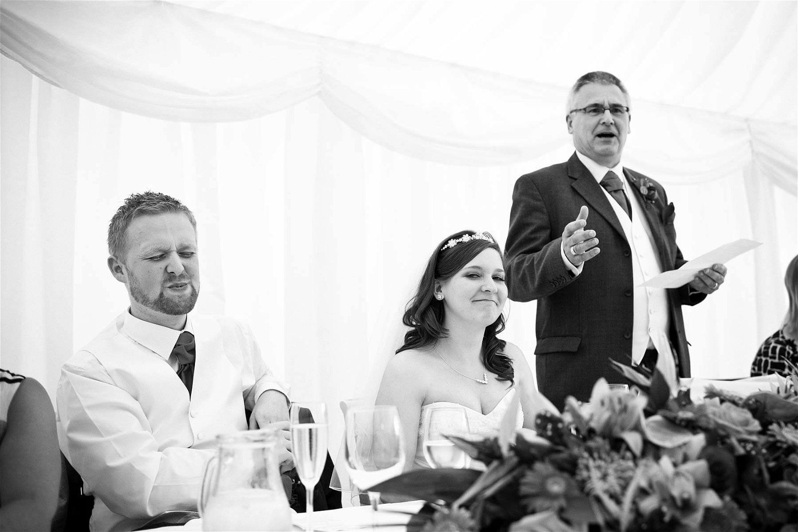 Storytelling candid photographs of the speeches at Hogarths Hotel in Dorridge by Documentary Wedding Photographer Stuart James