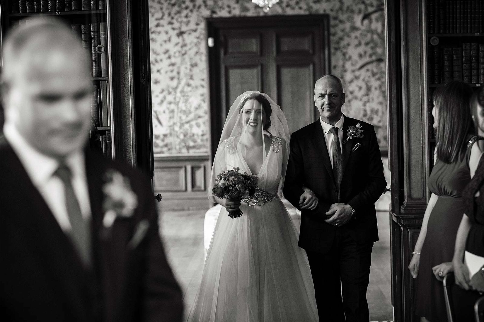 Capturing the procession of the Bride and Bridal party at Sandon Hall in Stafford by Stafford Reportage Wedding Photographer Stuart James
