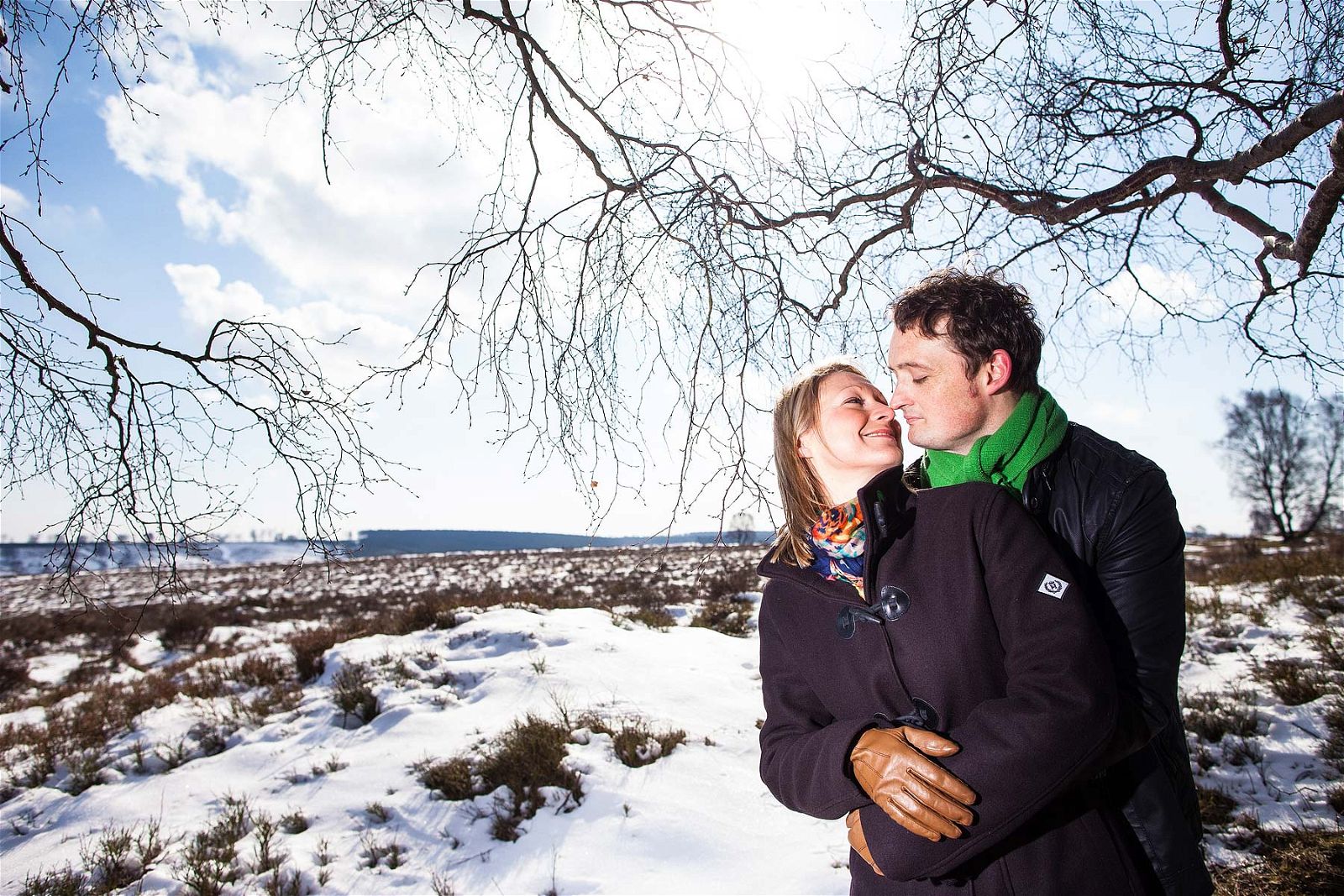 Relaxed engagement shoot on the snowy Cannock Chase in Staffordshire by Stafford Reportage Wedding Photographer Stuart James