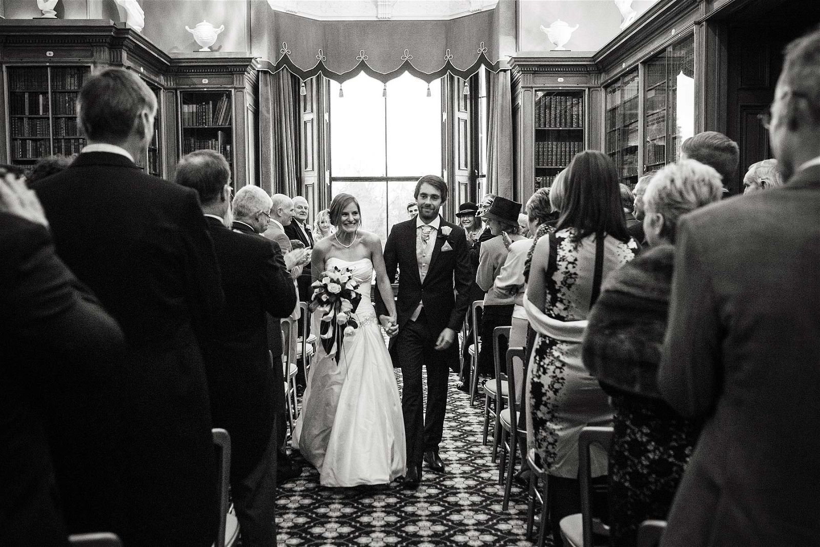 Reportage photography captures the emotion and feeling during the vow ceremony at Sandon Hall in Stafford by Documentary Wedding Photographer Stuart James