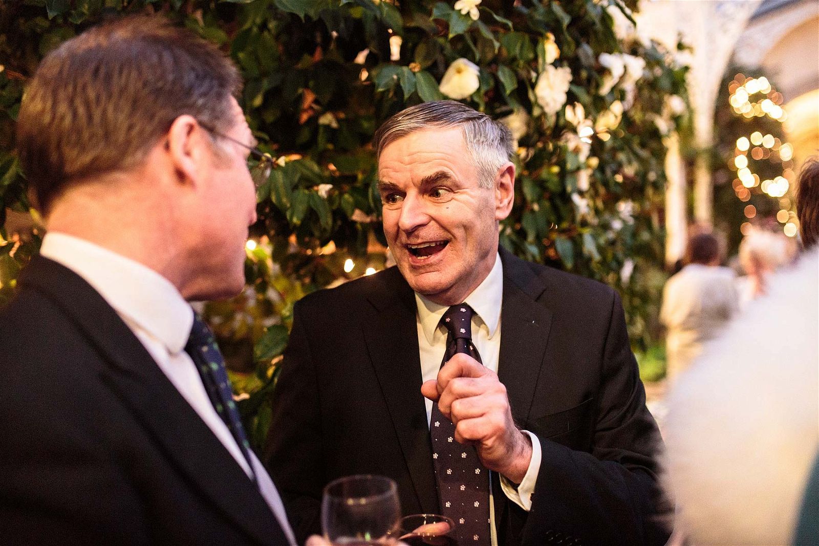 Candid photos as the guests enjoy the drinks reception at Sandon Hall in Stafford by Documentary Wedding Photographer Stuart James