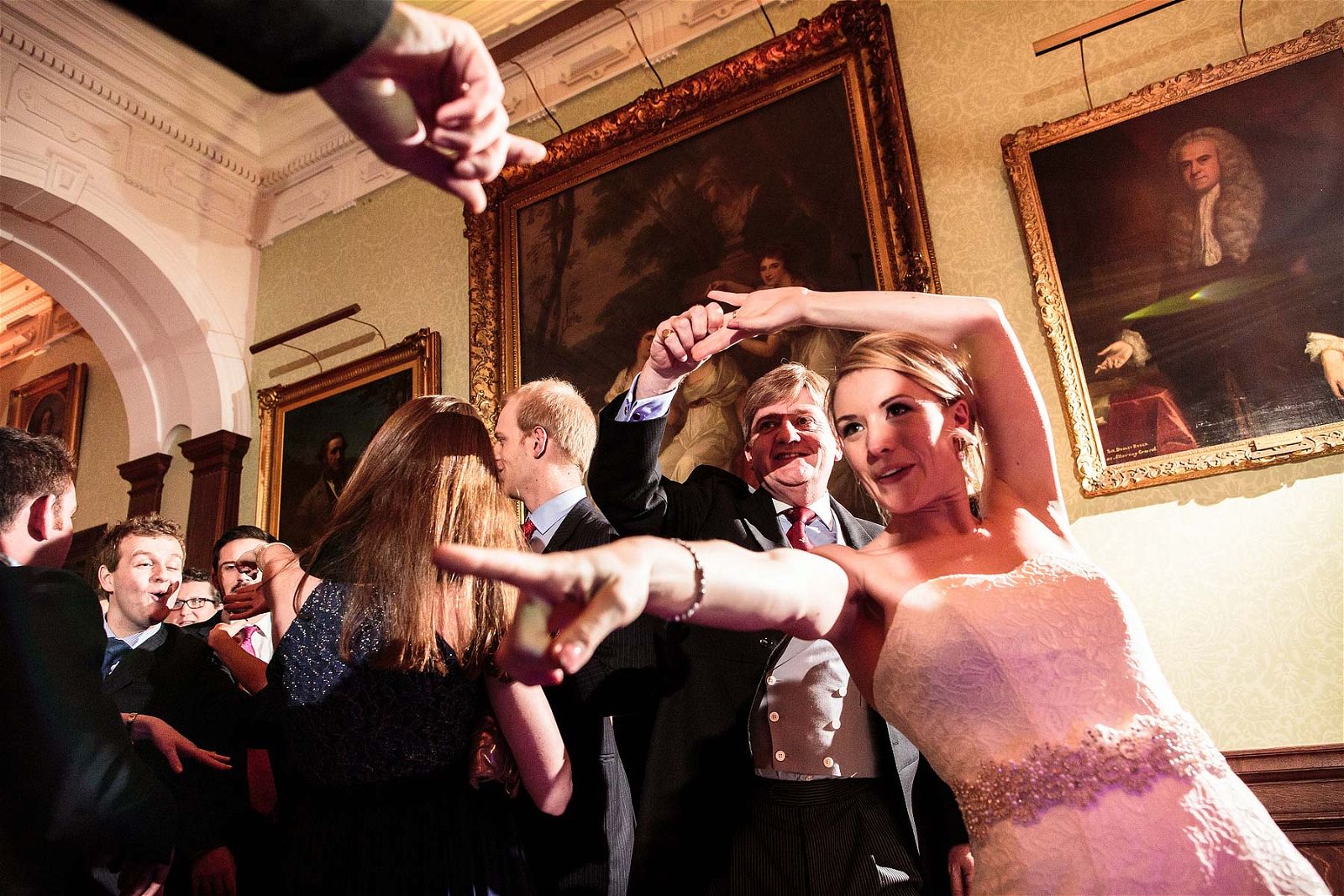 Fabulous fun photographs of the dancing at Sandon Hall in Stafford by Staffordshire Documentary Wedding Photographer Stuart James