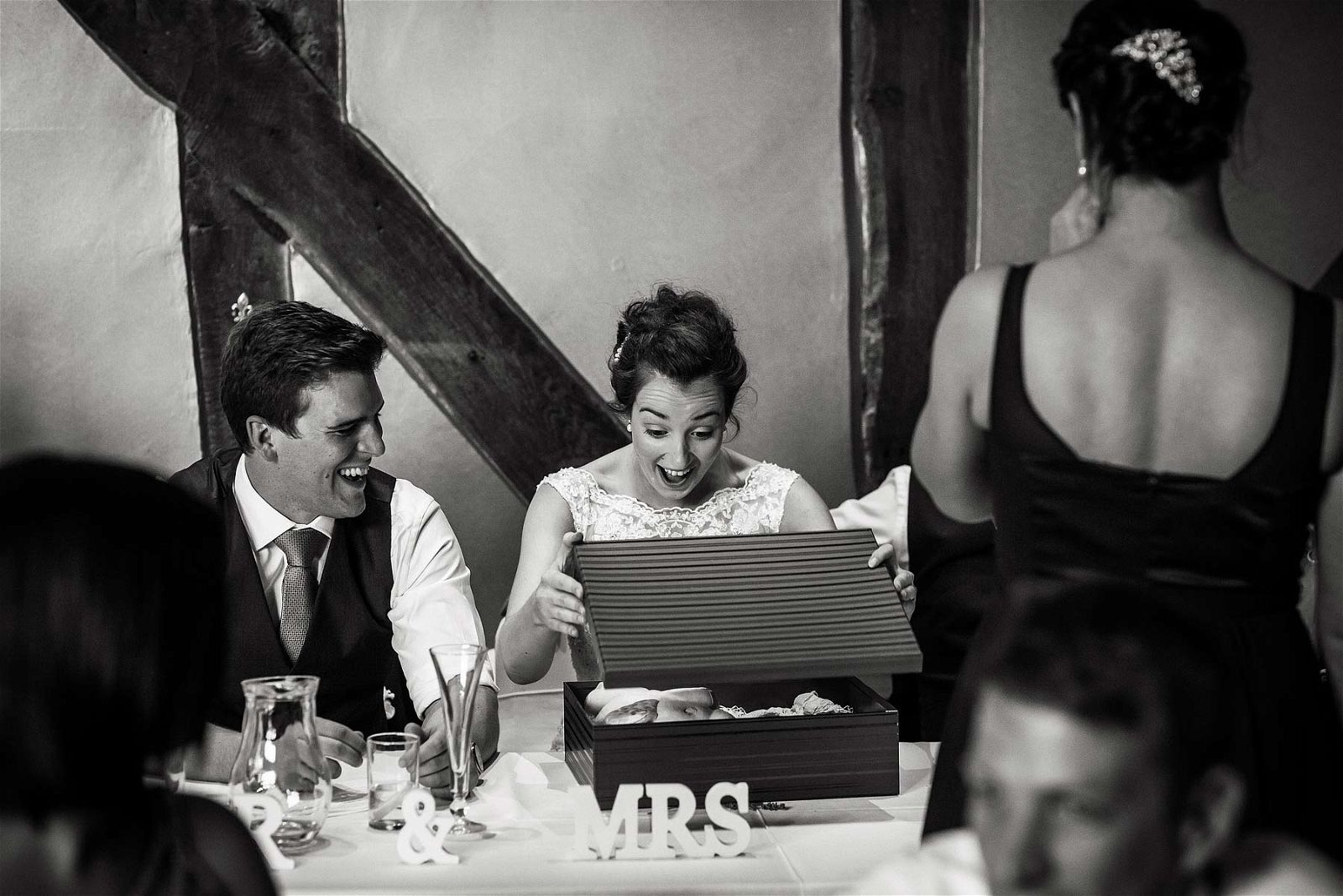Wedding speeches show such great stories and relationships when captured with timeless reportage style of photography, as here at Hundred House Hotel in Norton by Shropshire Reportage Wedding Photographer Stuart James