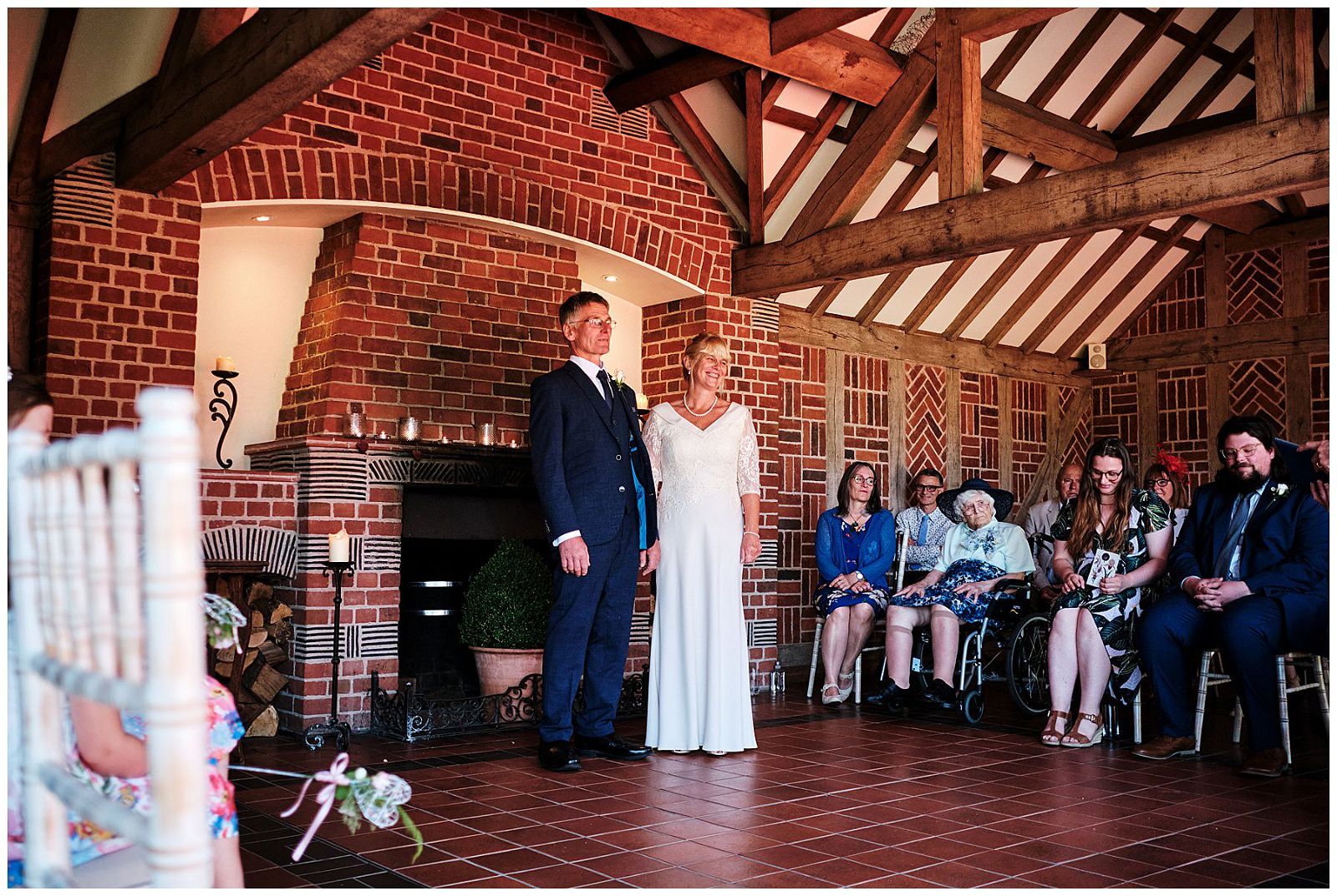 Capturing the emotions and moments of the wedding ceremony in the Garden Pavilion at Goldstone Hall in Shropshire by Documentary Wedding Photographer Stuart James