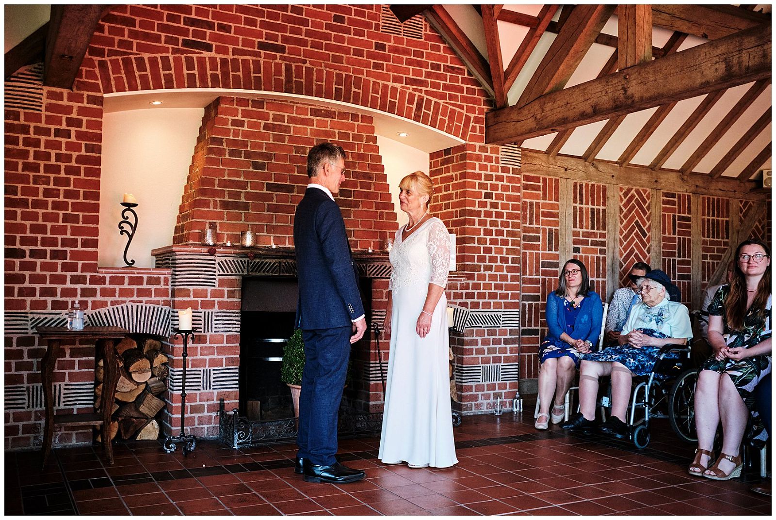 Capturing the emotions and moments of the wedding ceremony in the Garden Pavilion at Goldstone Hall in Shropshire by Documentary Wedding Photographer Stuart James