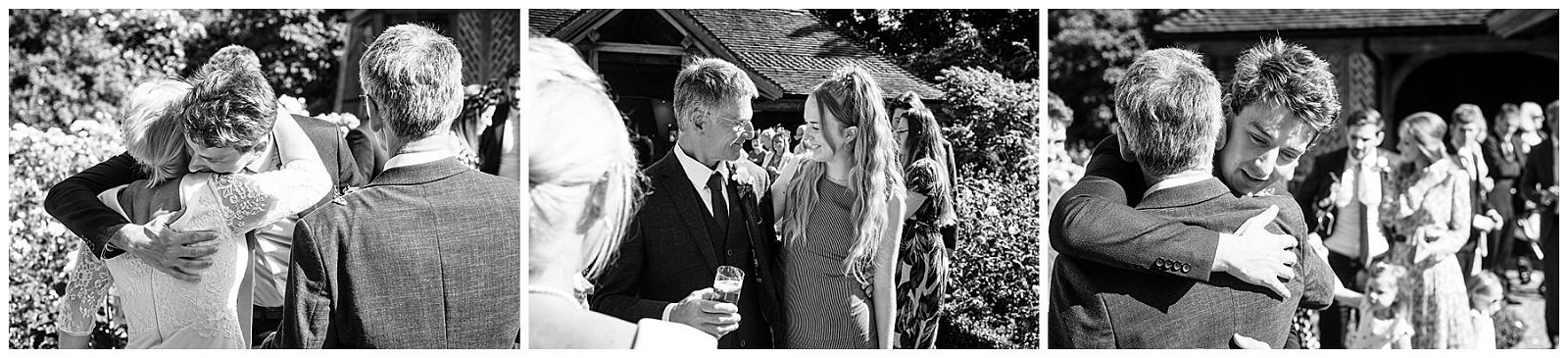 Candid photographs capturing the guests greeting the newlyweds at Goldstone Hall in Shropshire by Documentary Wedding Photographer Stuart James
