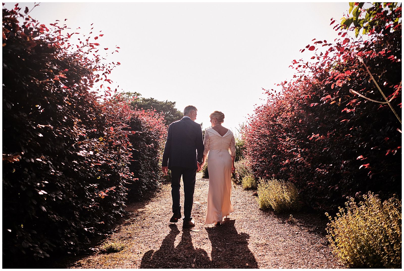 Creative couples portraits around the grounds and gardens at Goldstone Hall in Shropshire by Documentary Wedding Photographer Stuart James