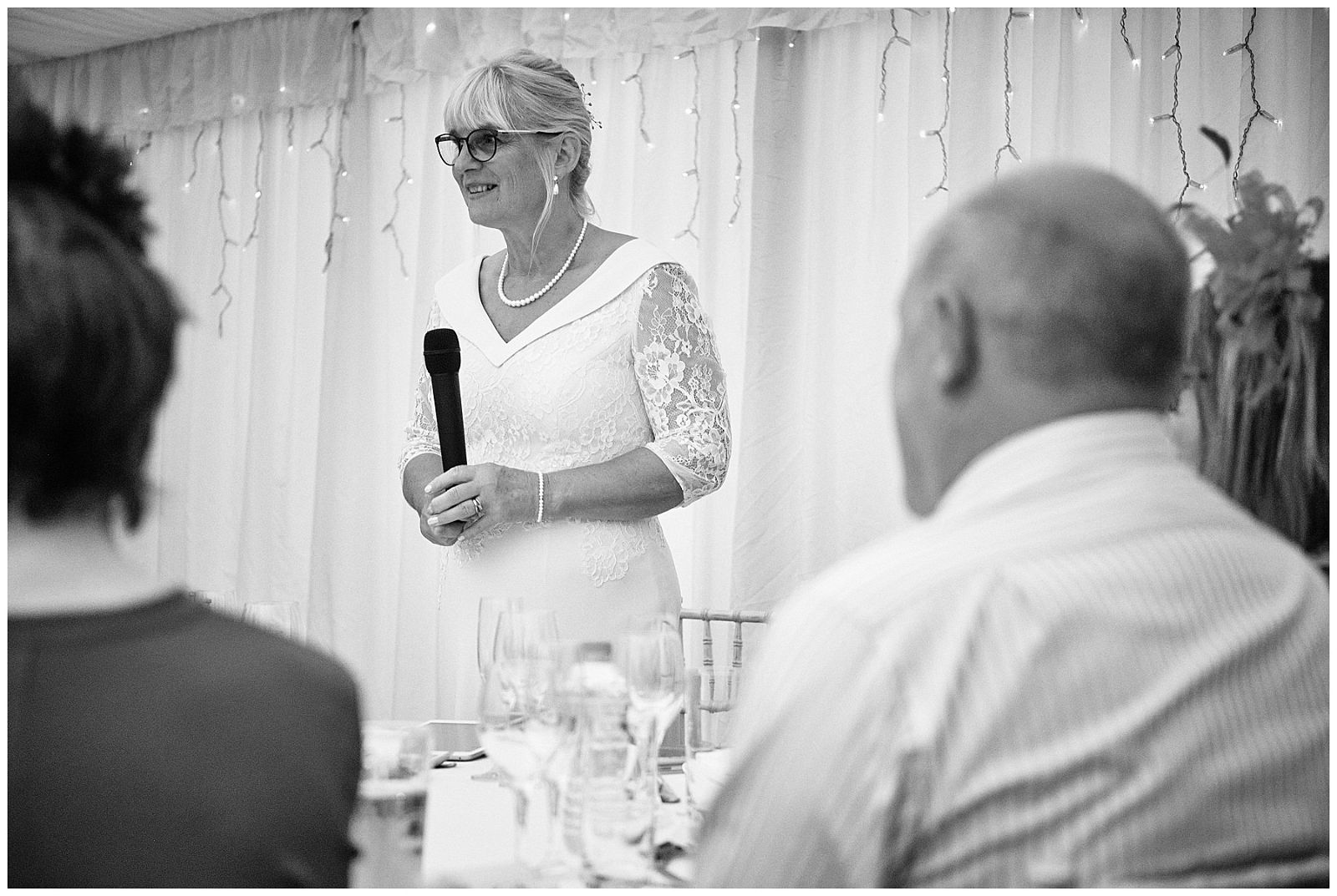 Welcome speech and brilliant guest reactions as our bride takes to the microphone at Goldstone Hall in Shropshire by Documentary Wedding Photographer Stuart James