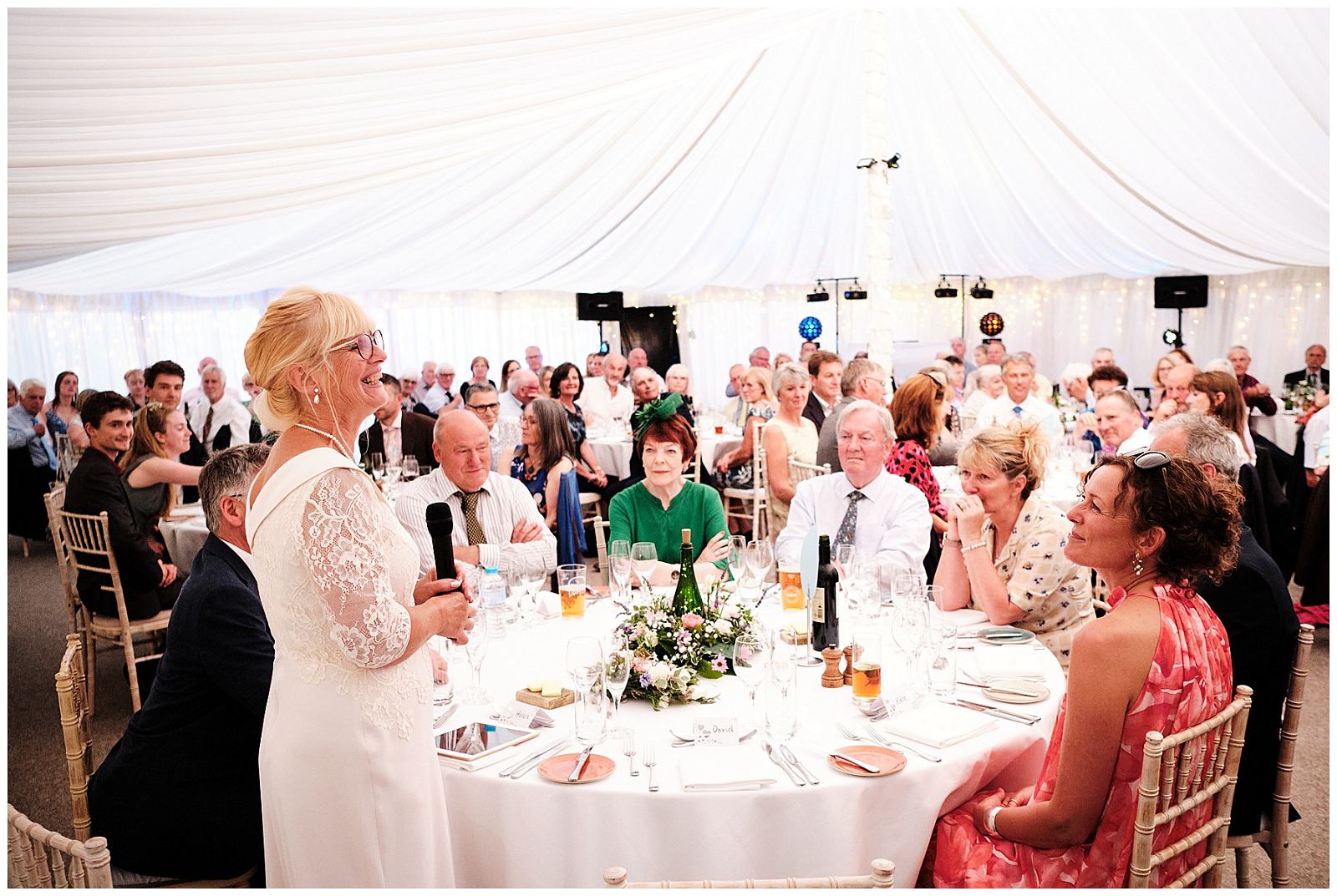 Welcome speech and brilliant guest reactions as our bride takes to the microphone at Goldstone Hall in Shropshire by Documentary Wedding Photographer Stuart James