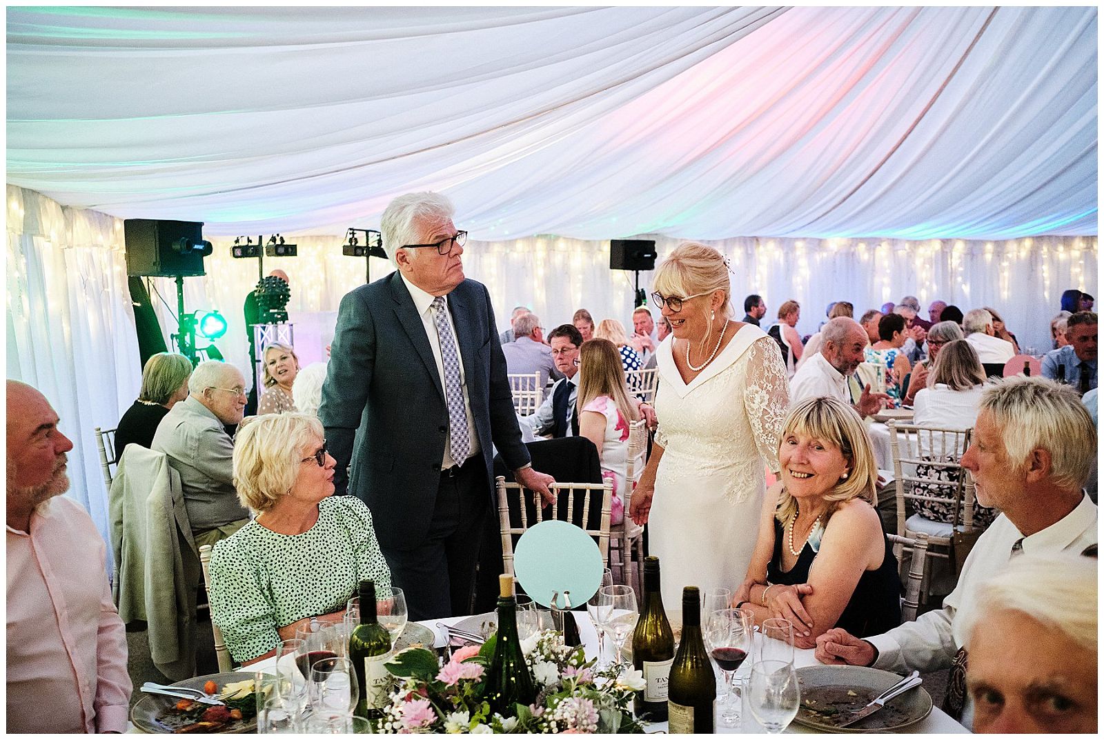 Natural photographs of the guests enjoying the wedding breakfast and evenings celebrations at Goldstone Hall in Shropshire by Documentary Wedding Photographer Stuart James
