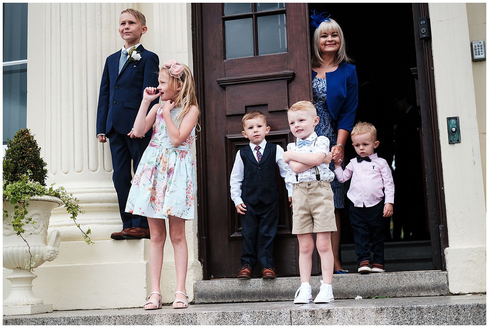 Candid photographs capturing the arrival of the wedding guests at Hawkstone Hall in Shrewsbury by Documentary Wedding Photographer Stuart James