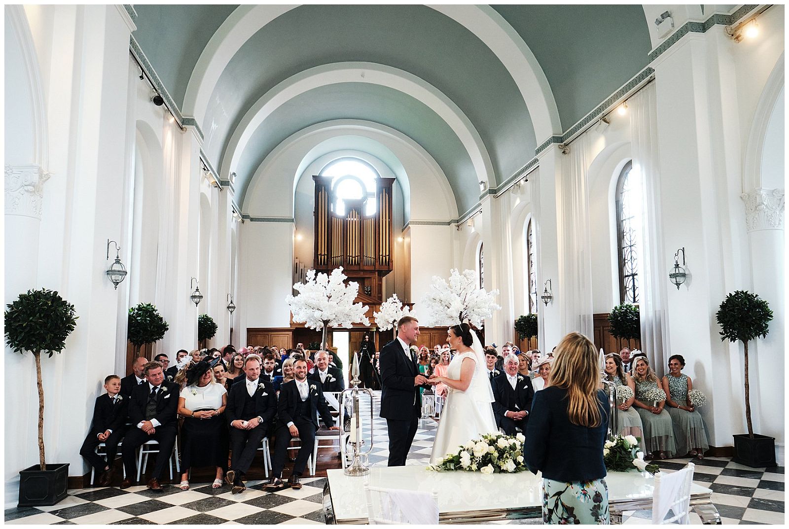 Capturing the exchange of rings at Hawkstone Hall in Shrewsbury by Documentary Wedding Photographer Stuart James