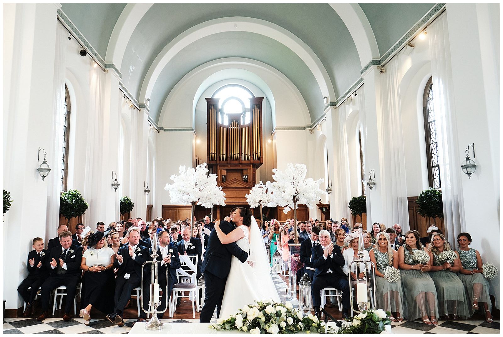 Stunning memories with the best reaction to being announced finally as husband and wife at Hawkstone Hall in Shrewsbury by Documentary Wedding Photographer Stuart James