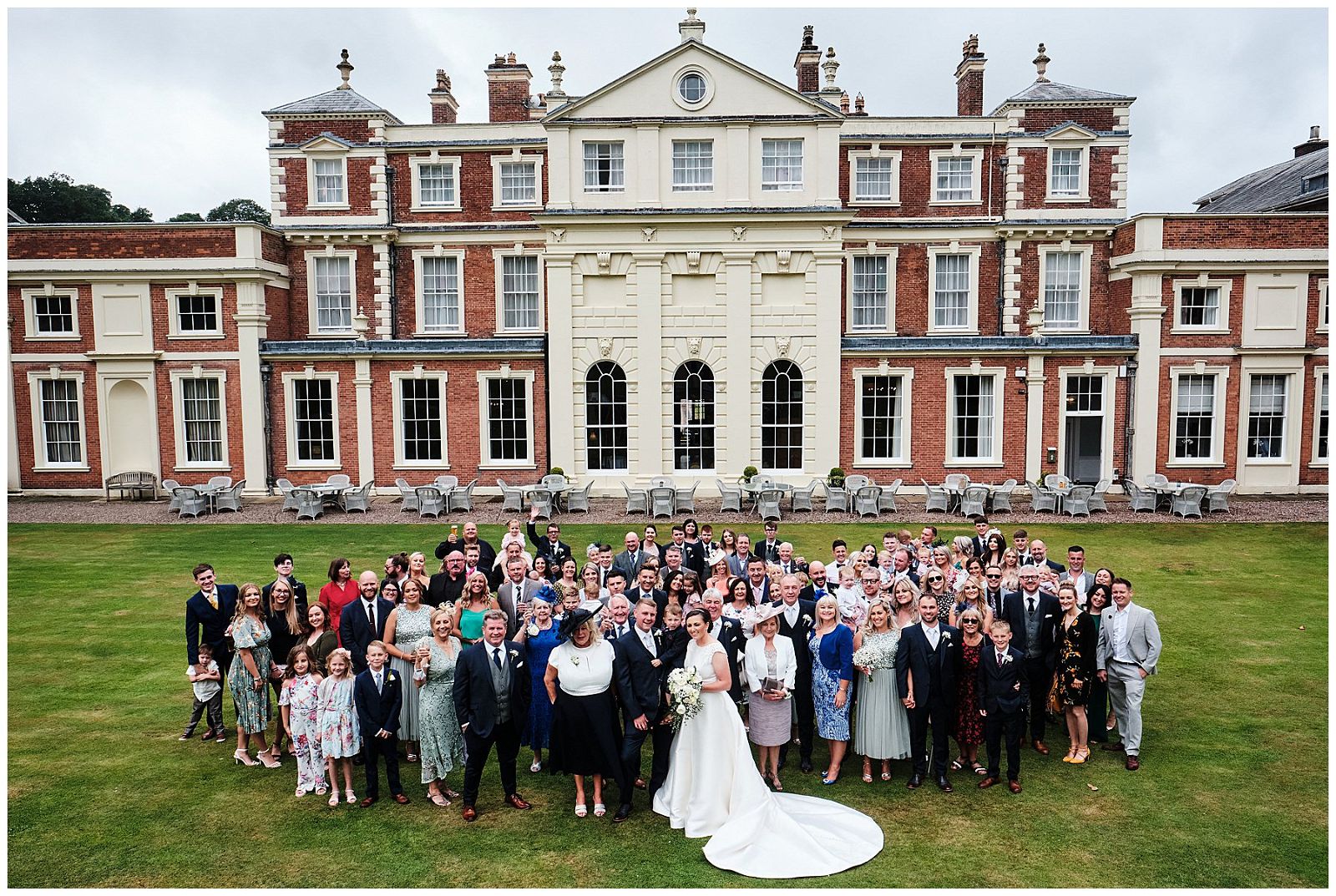 Relaxed family photographs in the grounds at Hawkstone Hall in Shrewsbury by Documentary Wedding Photographer Stuart James