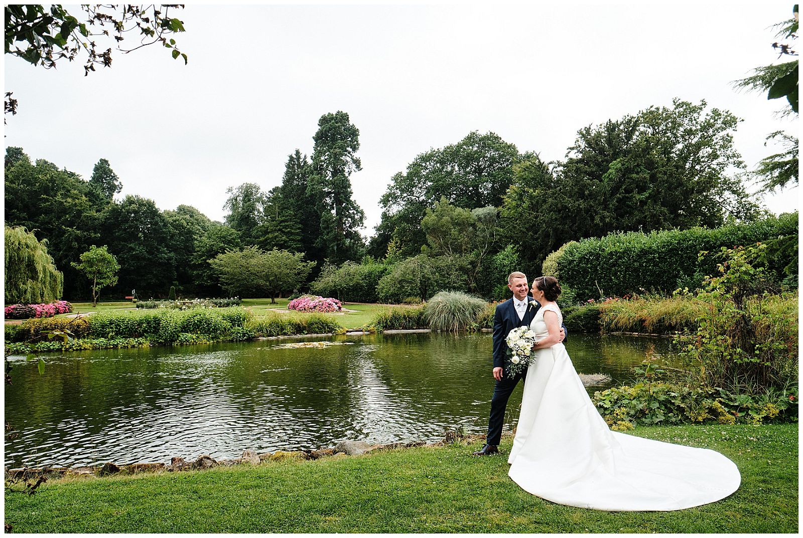 Natural portraits of the bride and groom around the beautiful gardens at Hawkstone Hall in Shrewsbury by Documentary Wedding Photographer Stuart James