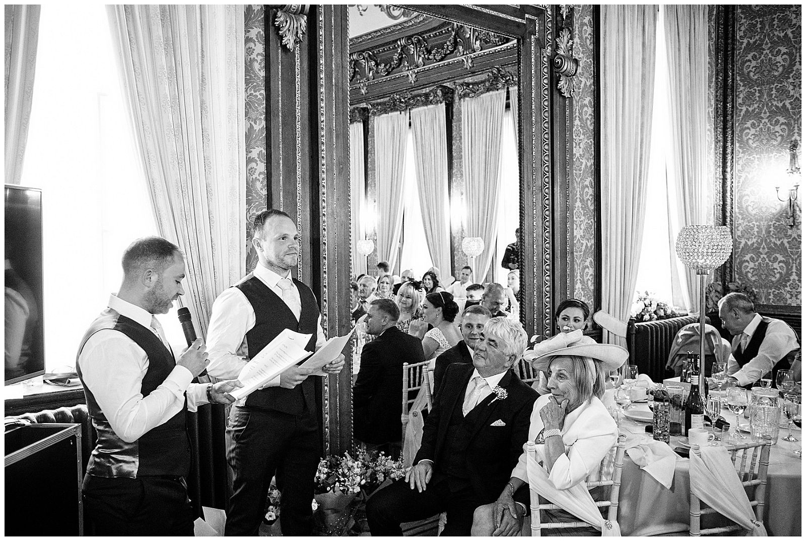 Brilliant speeches by Moz and Taur as best men, eliciting brilliant guest and couple reactions at Hawkstone Hall in Shrewsbury by Documentary Wedding Photographer Stuart James