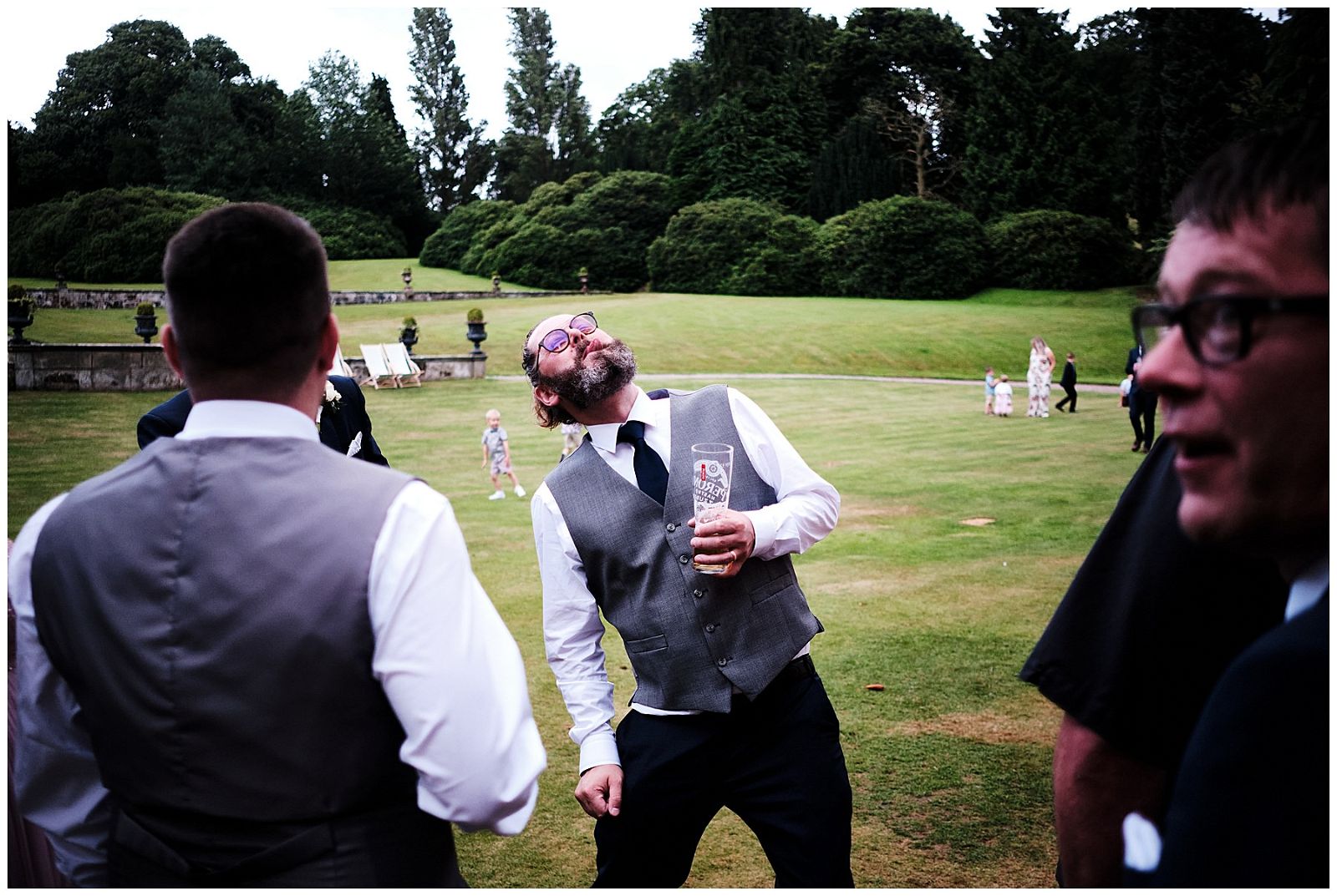 Creative candid photographs as the guests arrive to enjoy and join a wonderful evening reception at Hawkstone Hall in Shrewsbury by Documentary Wedding Photographer Stuart James