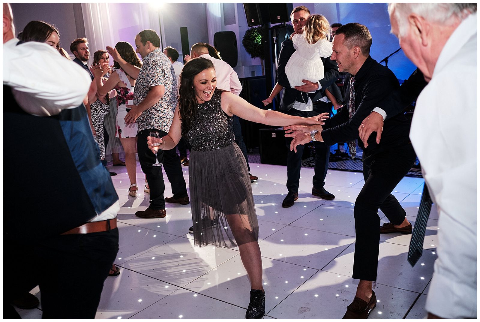 As the party really gets started and serious shapes are thrown on the dance floor, there are seriously great moments to be captured at Hawkstone Hall in Shrewsbury by Documentary Wedding Photographer Stuart James